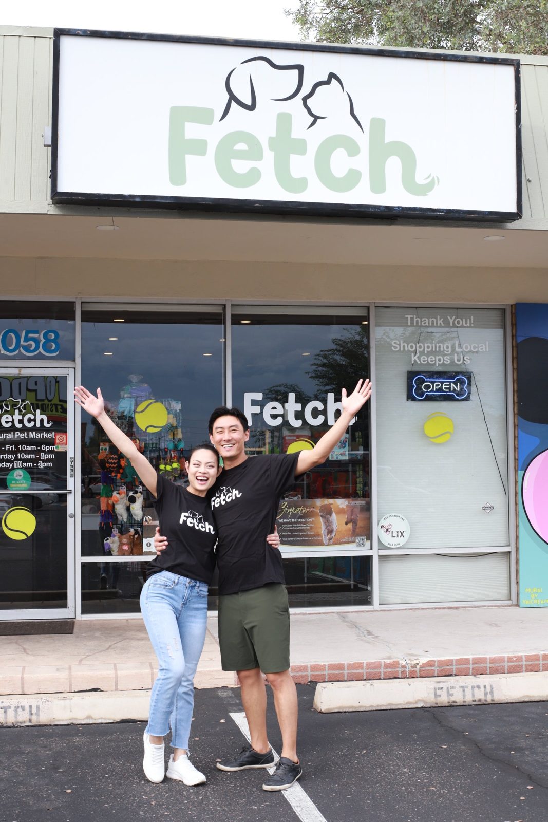 The owners of Fetch outside the shop's 16th Street storefront in Uptown Phoenix